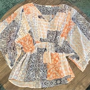 Boho flowy top with elastic at natural waist in cute patchwork design